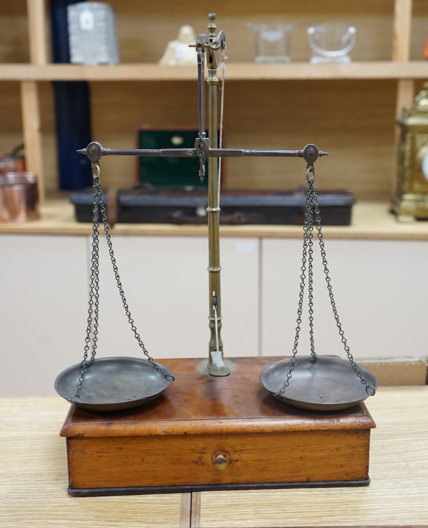 A set of Victorian mahogany and brass beam scales, by Avery, with a repair letter dated 1940 included, 45cm high. Condition - fair